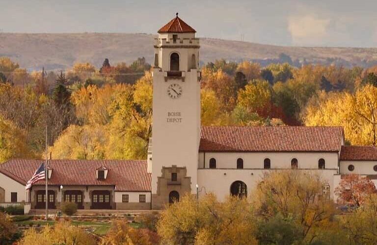 Boise Depot building with trees and hills in background