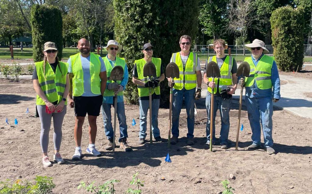 Some members of the Tyler Idaho team volunteering at the Rose Garden in Boise